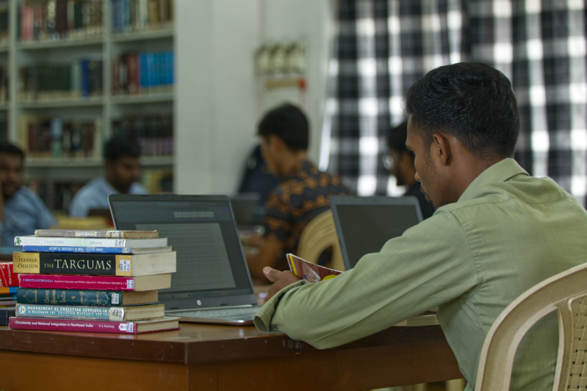 Student studying in Library Student studying in Library