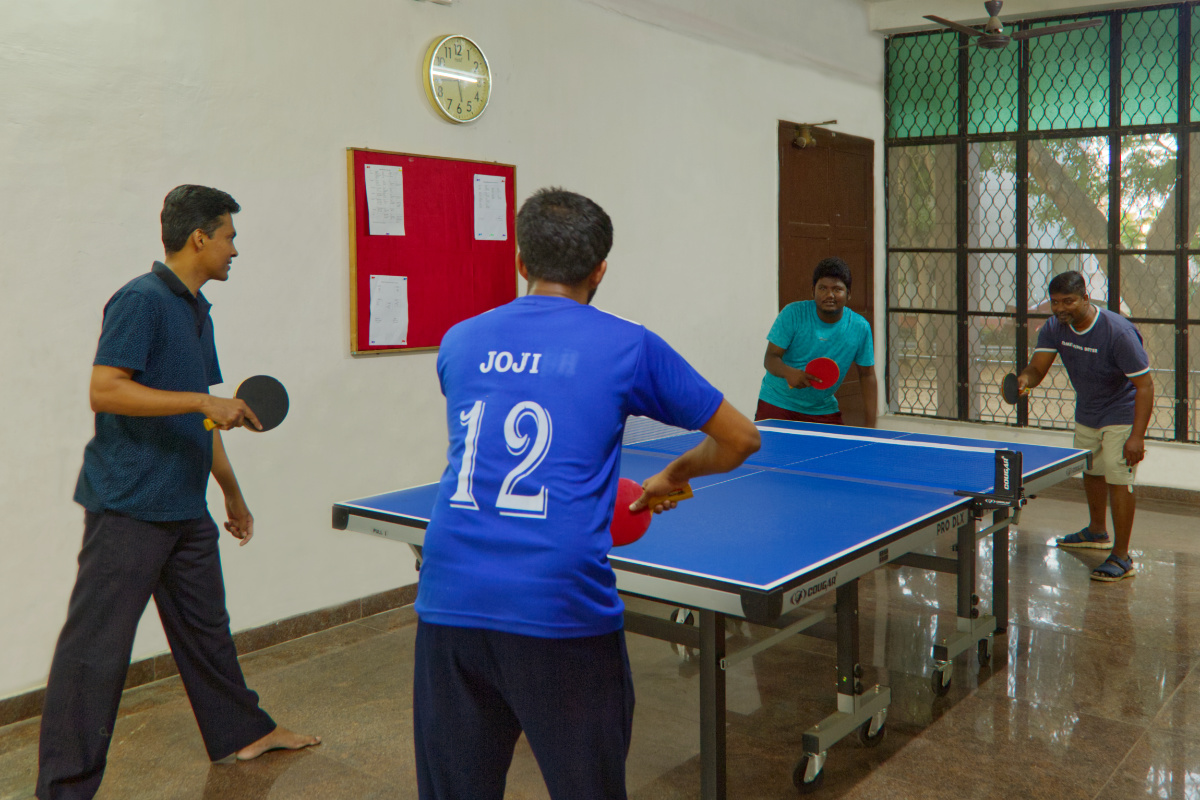 students playing table tennis in college